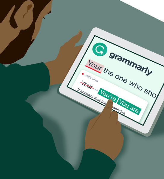 a man uses Grammarly on a tablet to correct his misspelling of 